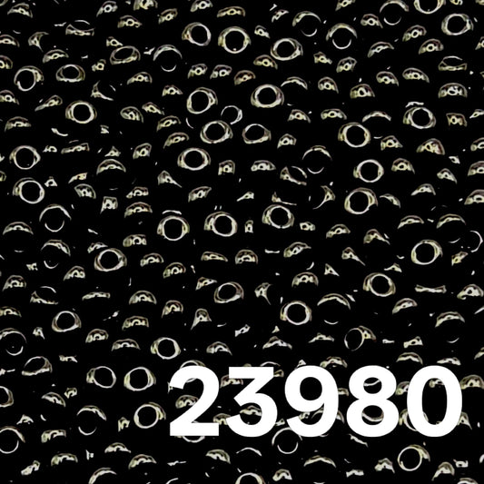 Close up background of Preciosa Czech seed beads 10/0 Opaque Black 23980 – Beadsy.ca