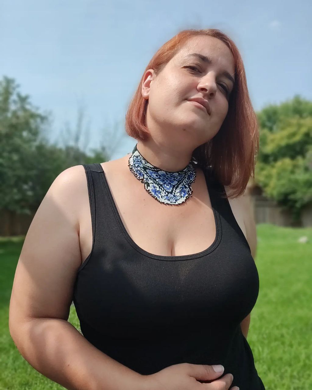 Model wearing Blue Aurora beaded collar necklace outdoors — adjustable choker