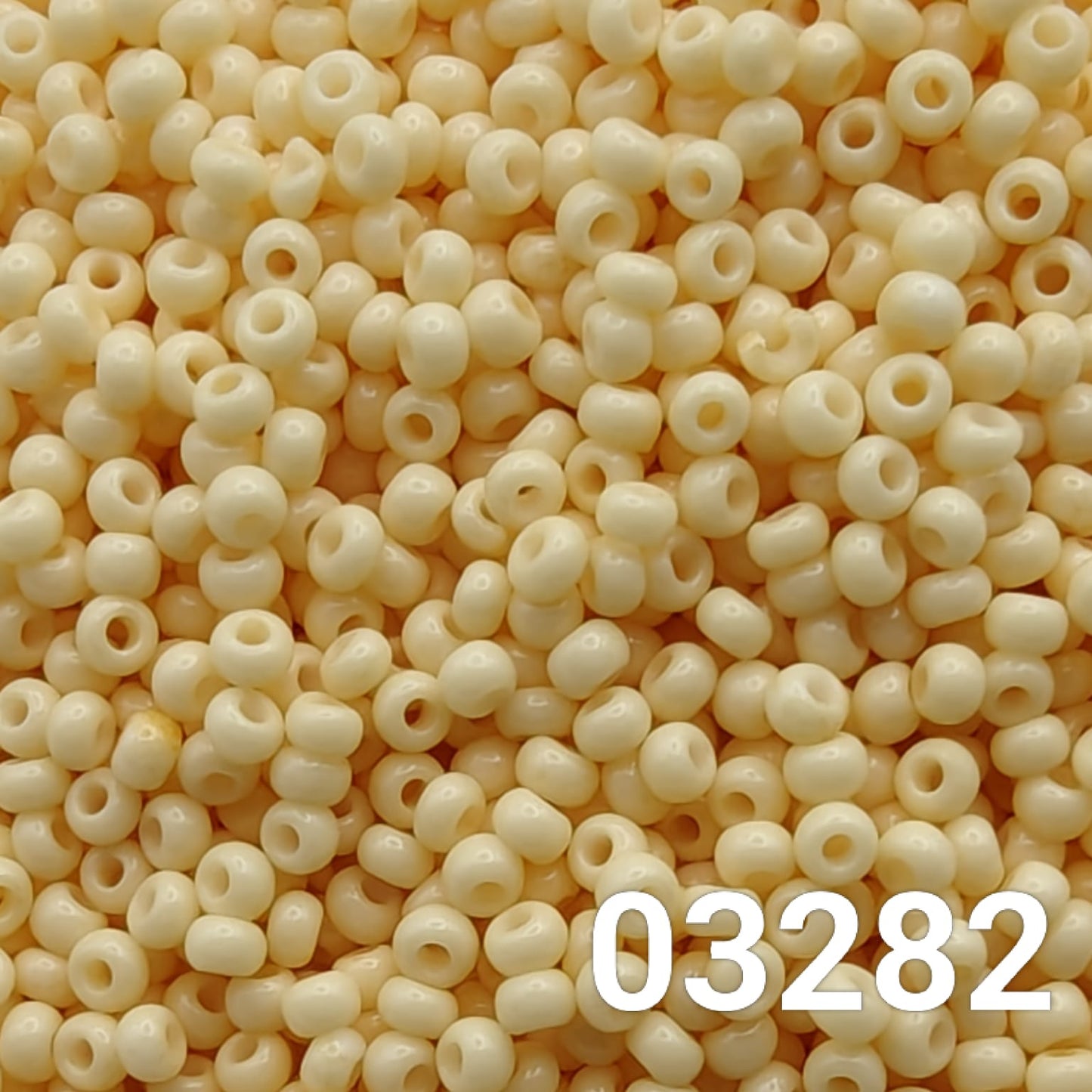 Close-up of Preciosa Czech Seed Beads 10/0 – Solgel Chalk Yellow 03282