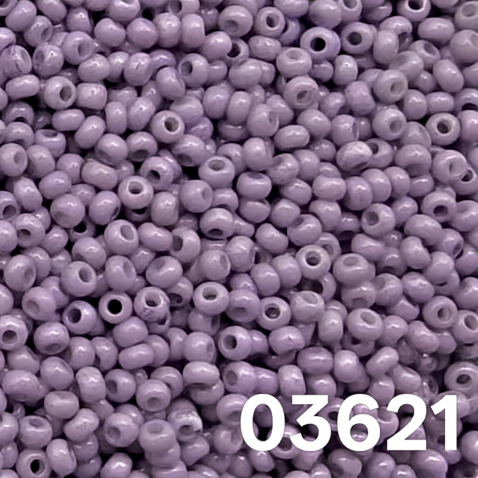 Close-up: Preciosa 10/0 Czech seed beads, Solgel Chalk Violet (03621) — glossy violet