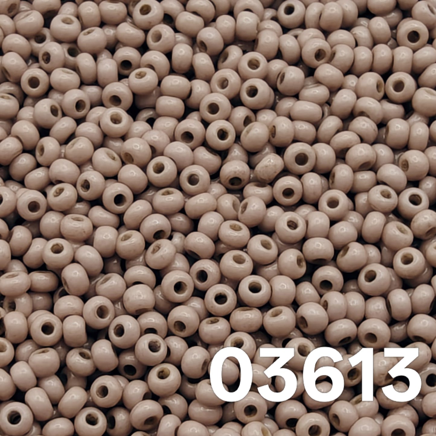 Close-up of Preciosa 100 Czech seed beads, Solgel Chalk Ashen Taupe (03613) — neutral taupe.