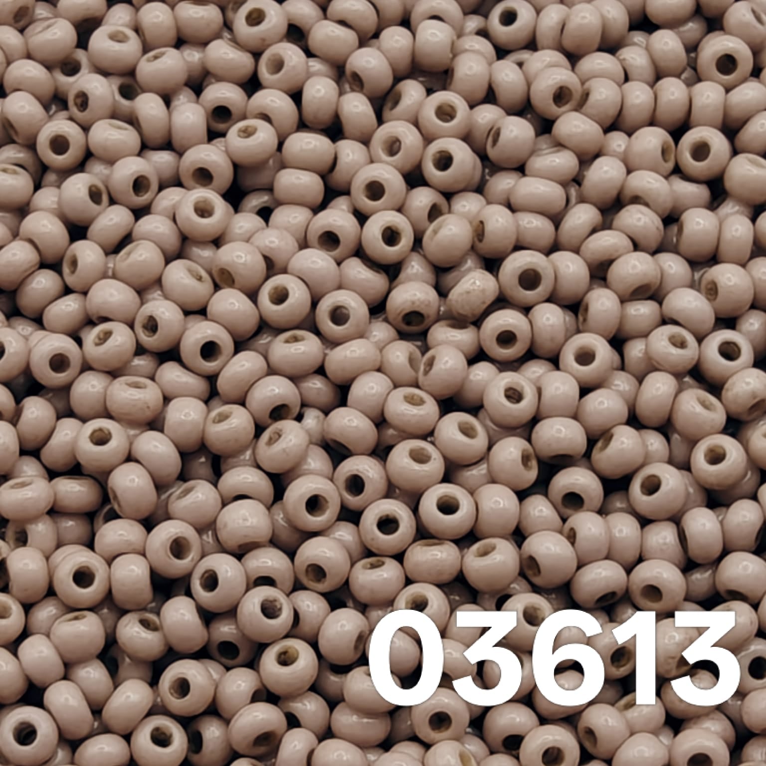 Close-up of Preciosa 100 Czech seed beads, Solgel Chalk Ashen Taupe (03613) — neutral taupe.
