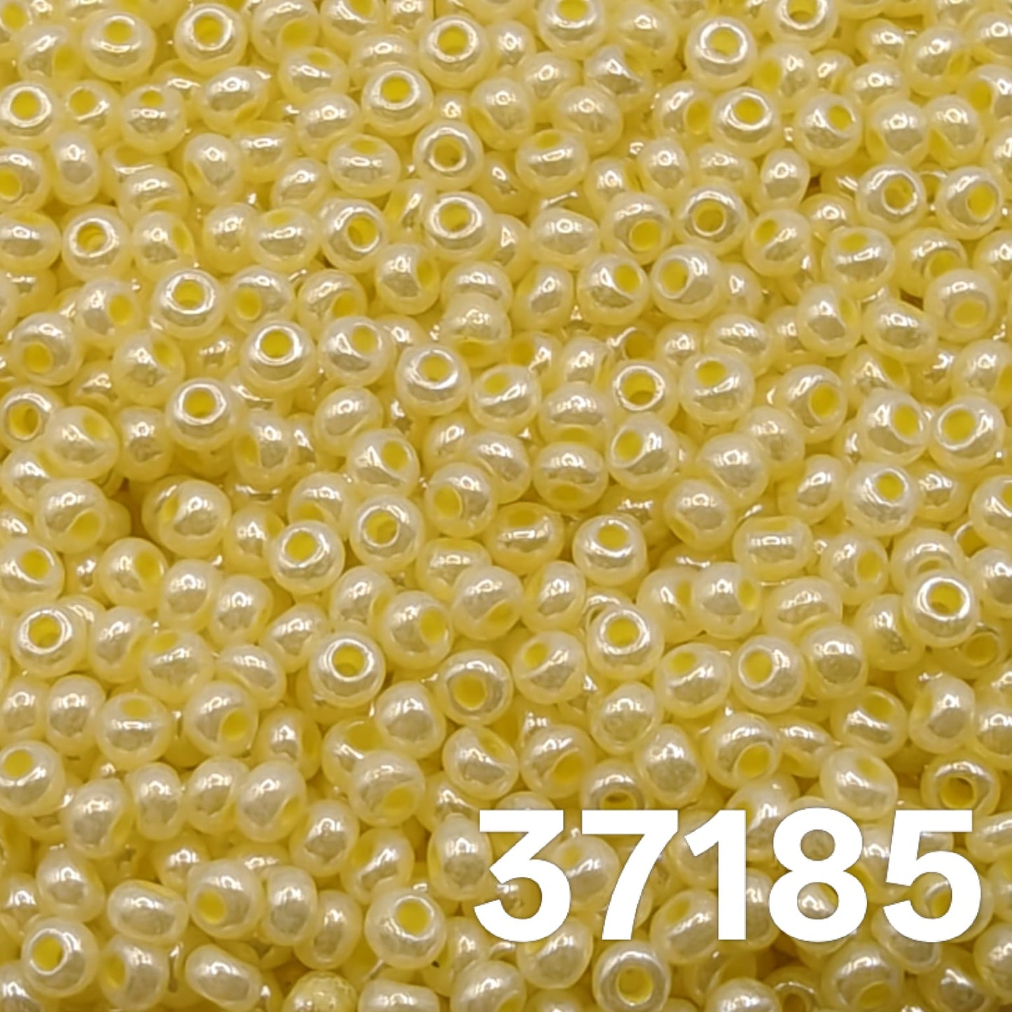 Close-up of Preciosa 10/0 Pearlized Light Yellow Ceylon seed beads, code 37185