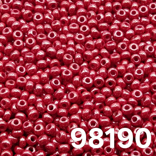Close-up of Preciosa Czech seed beads 10/0 Opaque Luster Red 98190 – round glass beads