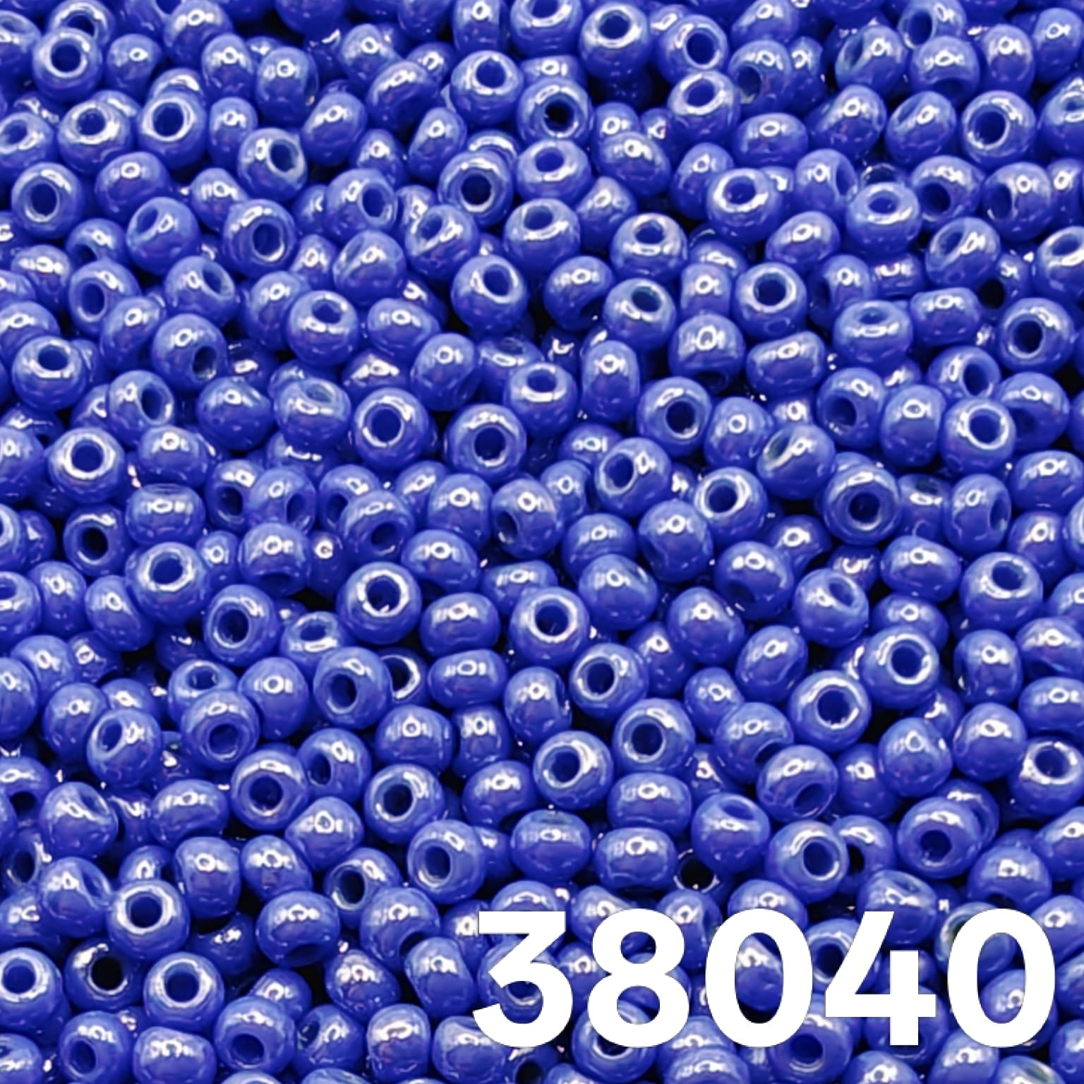 Close-up of Preciosa Ornela Czech glass seed beads color 38040 medium blue