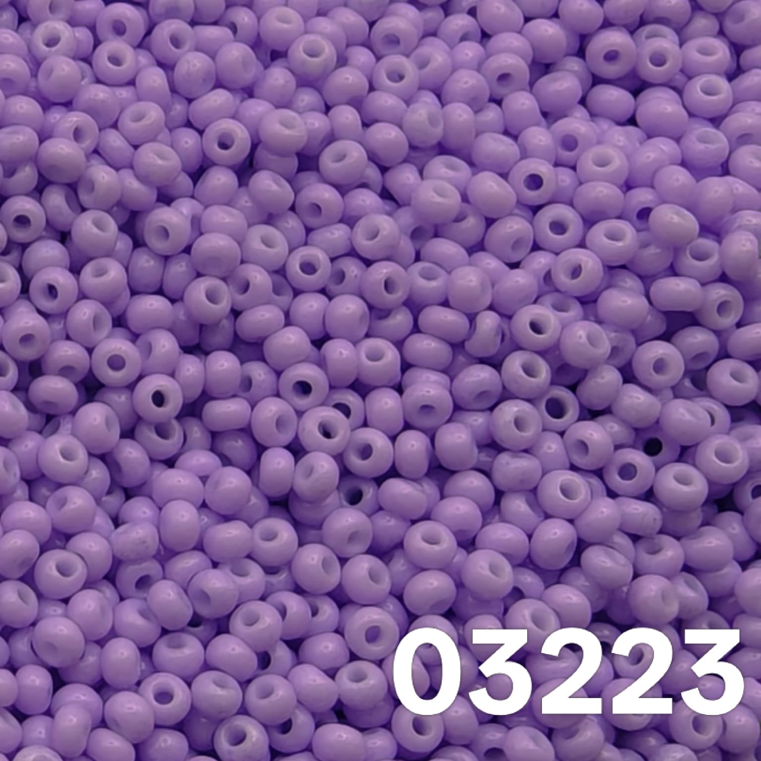 Close-up of Preciosa Solgel Chalk Violet seed beads 10/0 round glass