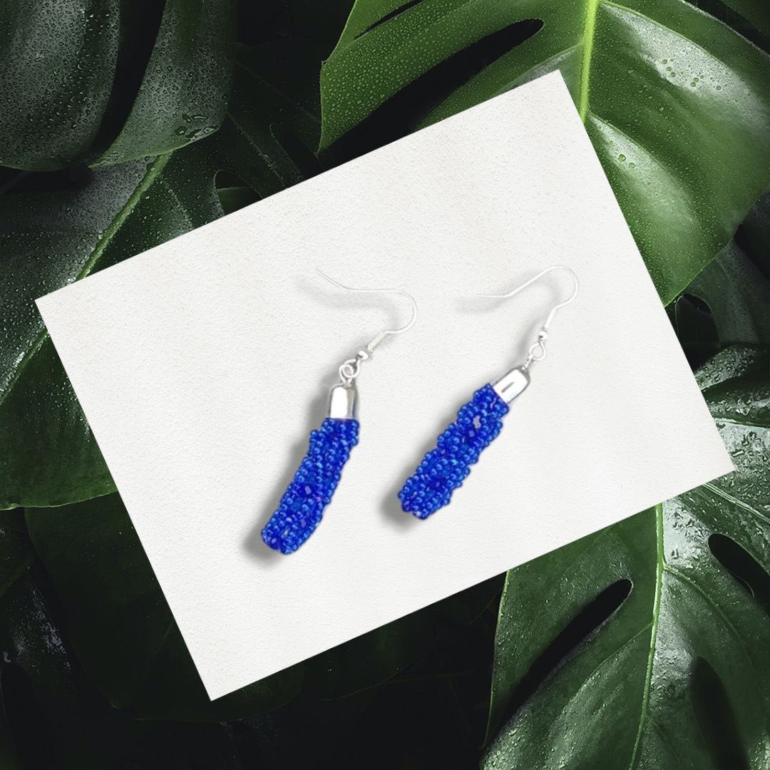 Cobalt blue seed bead drop earrings on silver hooks, close-up, handmade in Manitoba