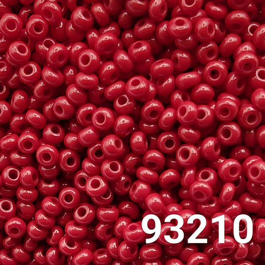 Close-up of Preciosa Czech seed beads 10/0 in opaque dark red color 93210