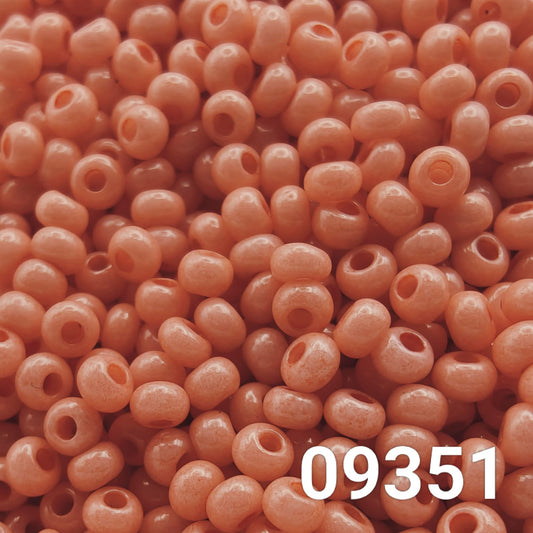 Close-up of Preciosa Czech seed beads 10/0 in dusty pink color 09351