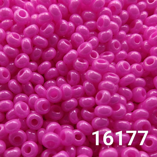 Close-up of Preciosa Czech seed beads 10/0 in opaque dyed chalk fuchsia color 16177