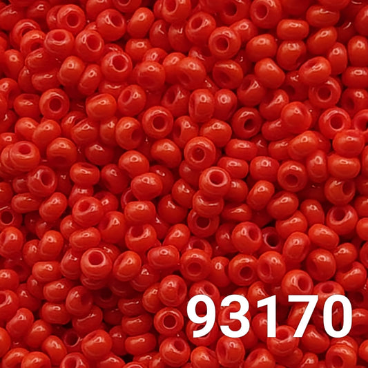 Close-up of Preciosa Czech seed beads 10/0 in opaque light red, colour code 93170