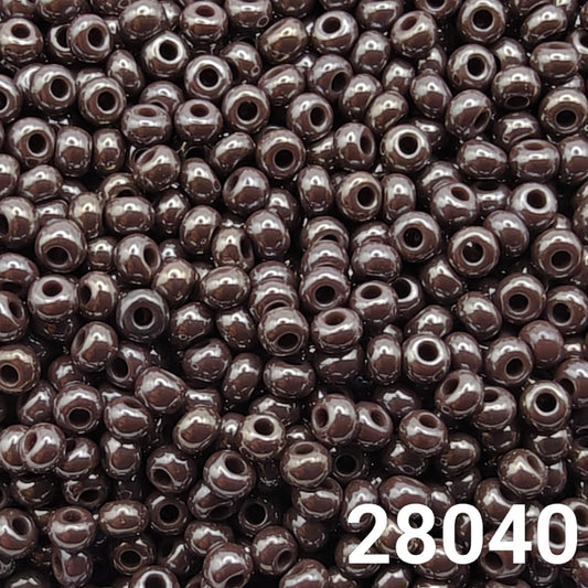 Close-up of round size 10/0 dark mauve luster seed beads by Preciosa