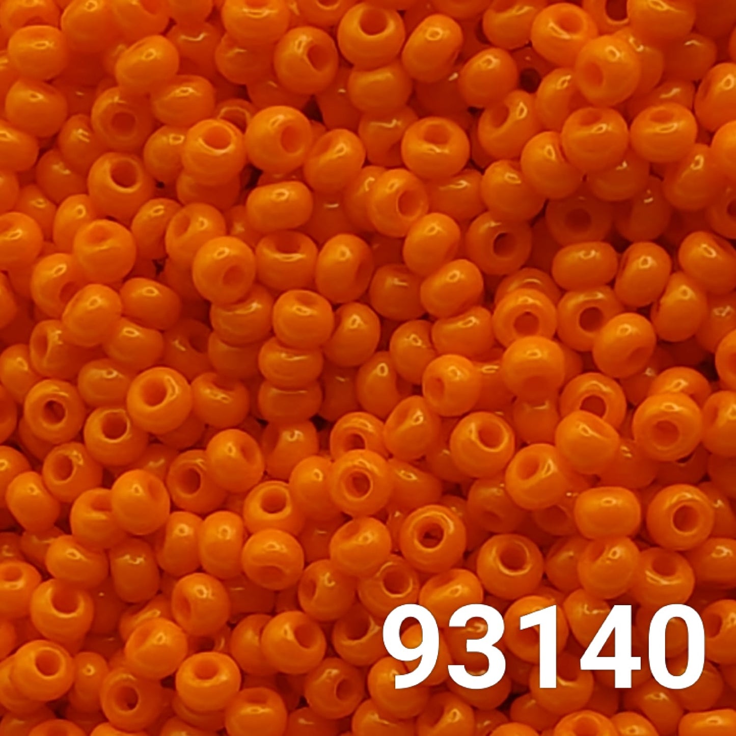Close-up of Preciosa Czech seed beads 10/0 in opaque orange - code 93140