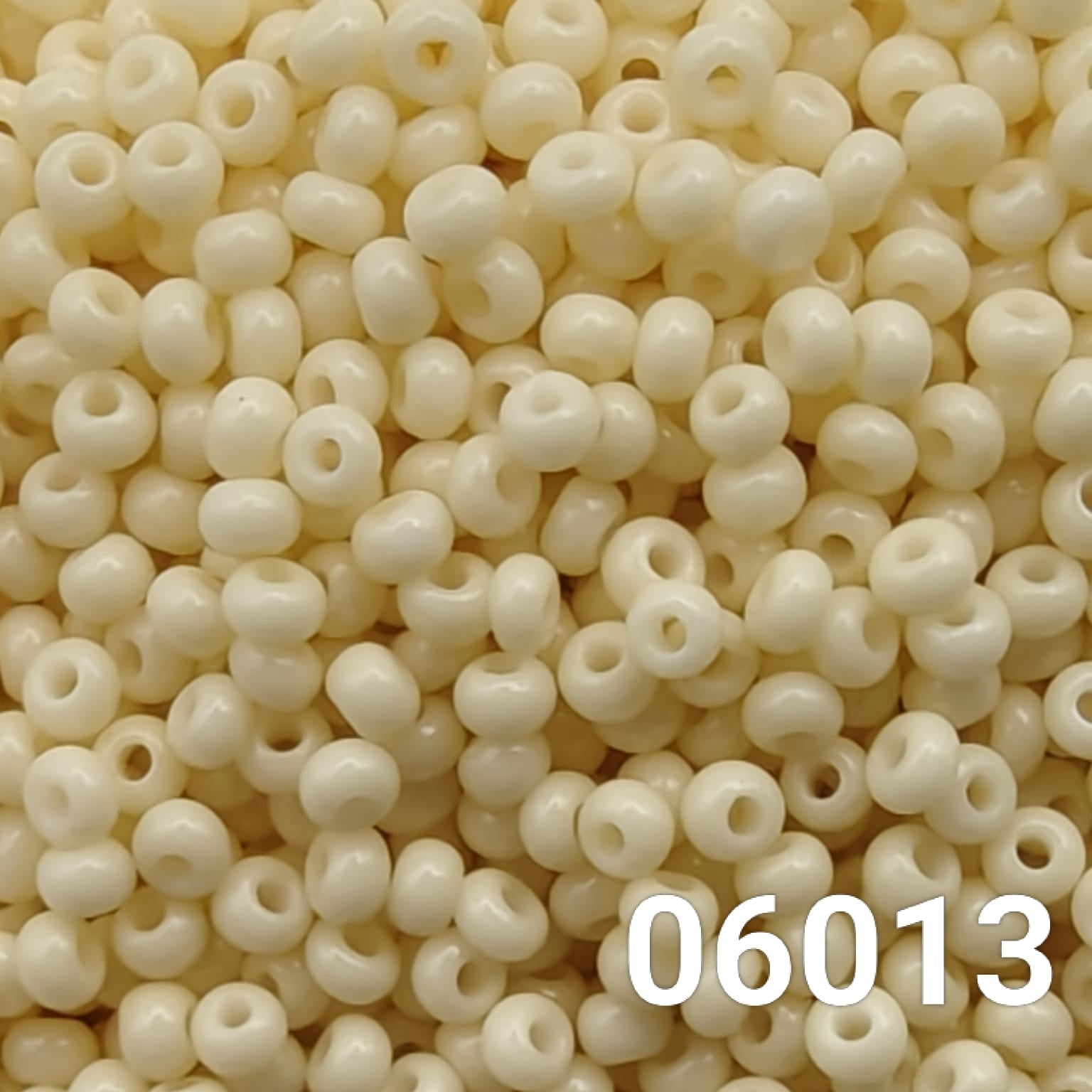 Close-up of Preciosa Czech seed beads 10/0 in opaque tan color 06013