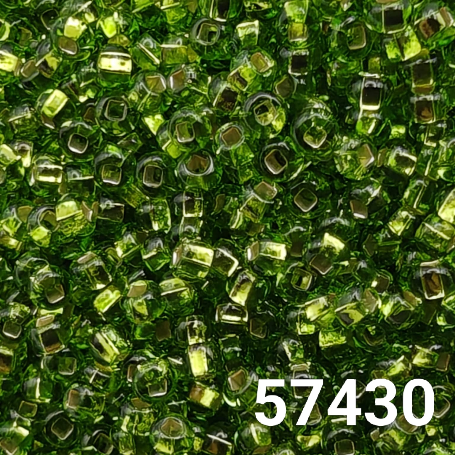Close-up of Preciosa Czech seed beads in silverlined chartreuse, size 10/0