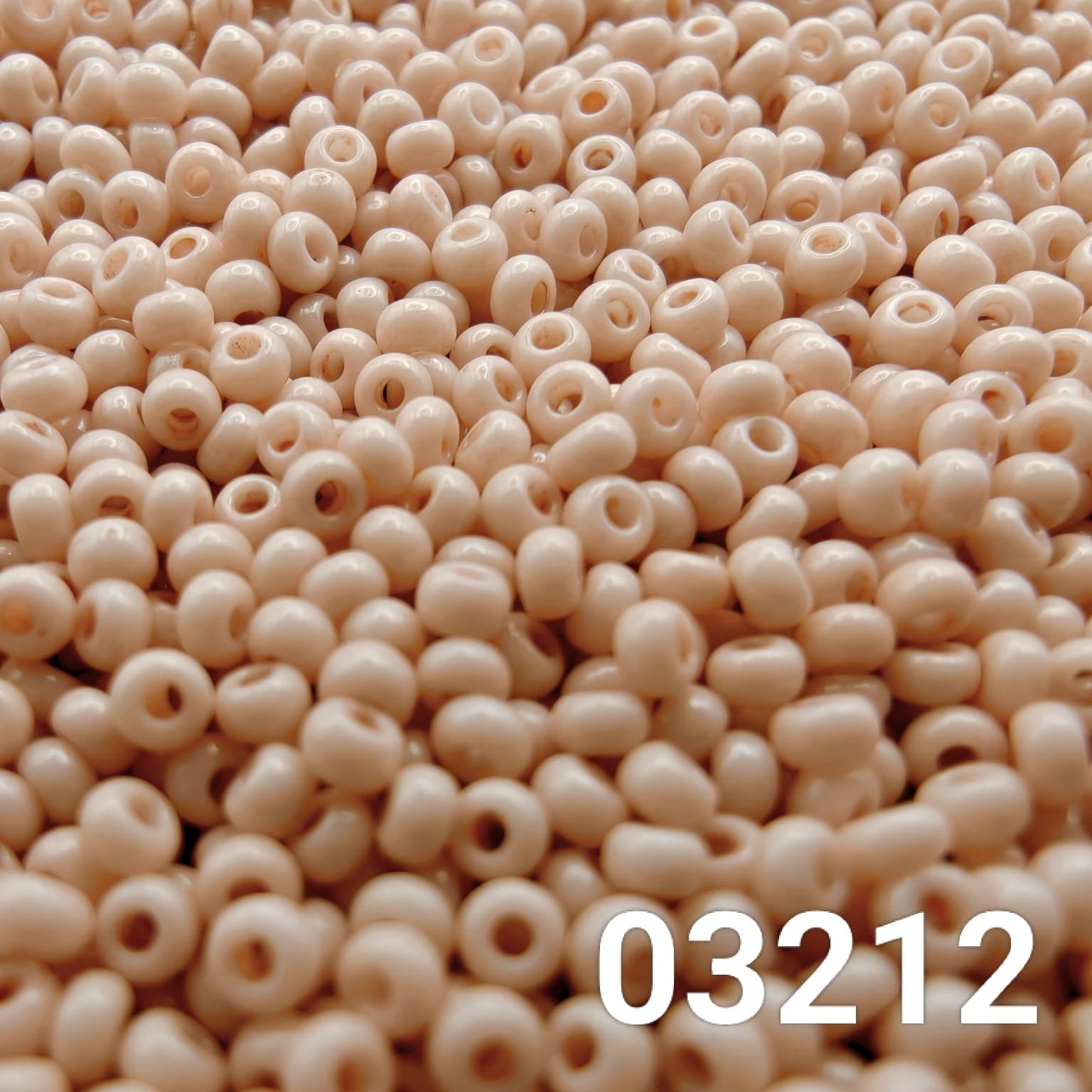 Close-up of Preciosa 10/0 seed beads in Solgel Chalk Blush Taupe color (03212)
