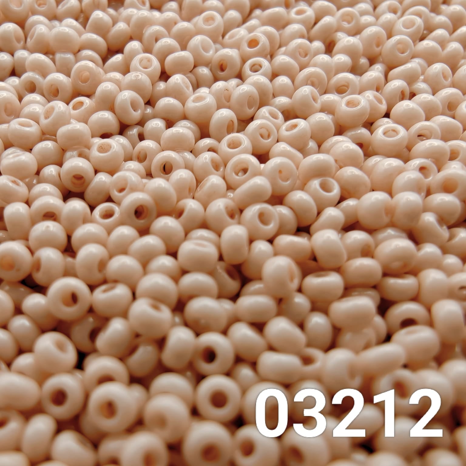 Close-up of Preciosa 10/0 seed beads in Solgel Chalk Blush Taupe color (03212)