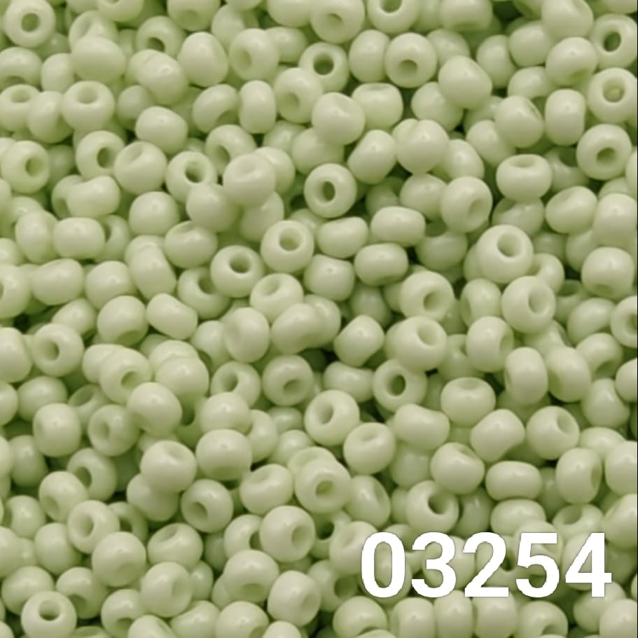 Close-up of Preciosa 10/0 seed beads in Solgel Chalk Green color (03254)