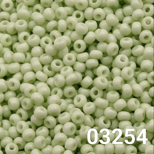 Close-up of Preciosa 10/0 seed beads in Solgel Chalk Green color (03254)