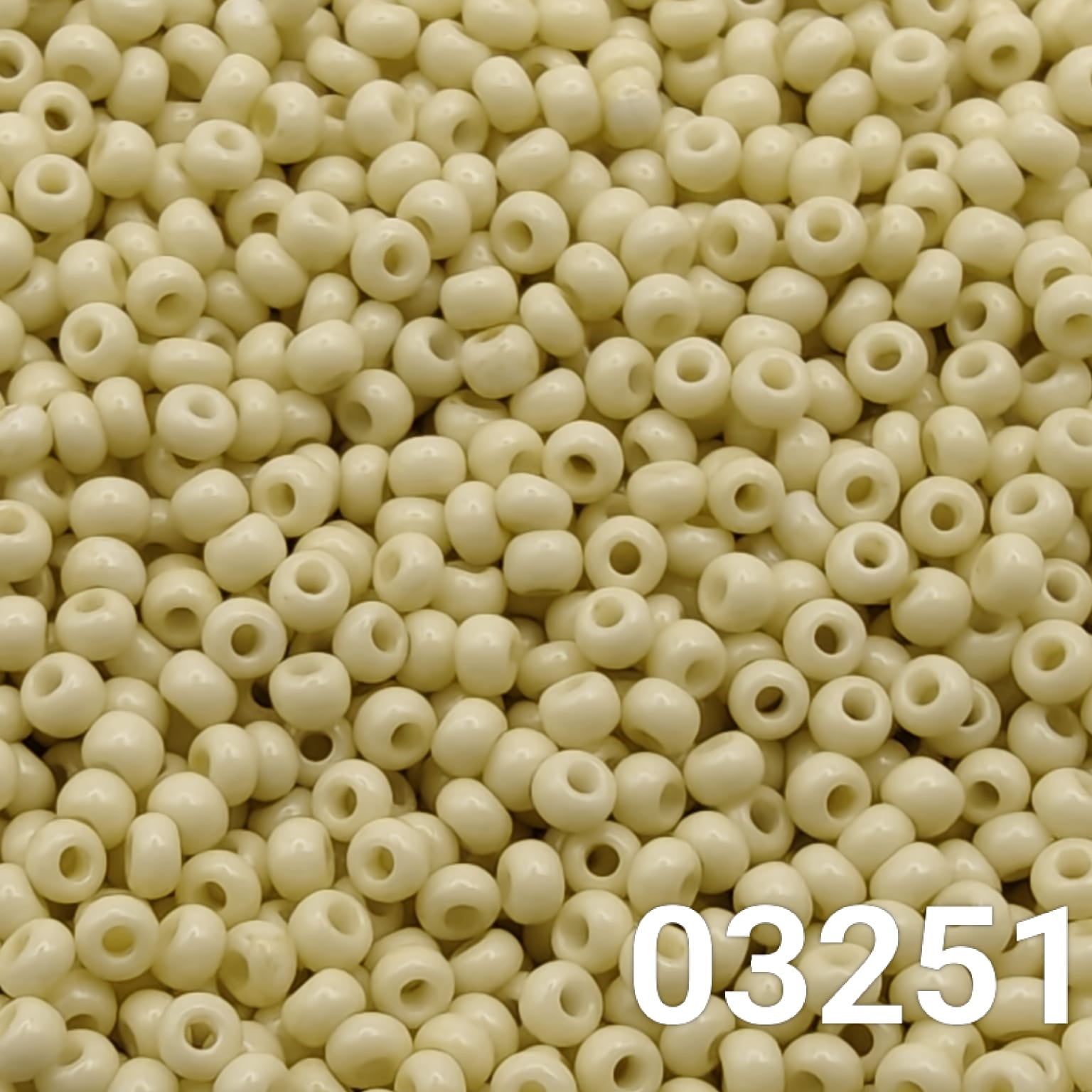 Close-up of Preciosa 10/0 seed beads in Solgel Chalk Yellow-Green colour (03251)
