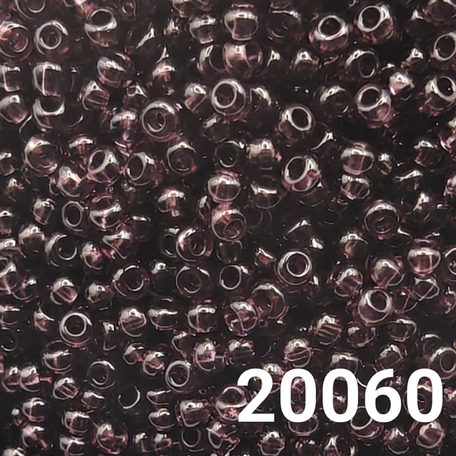 Preciosa 10/0 Transparent Amethyst seed beads close-up
