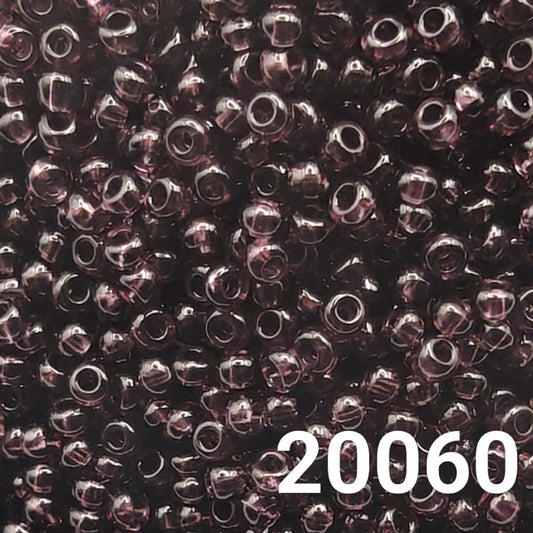 Preciosa 10/0 Transparent Amethyst seed beads close-up