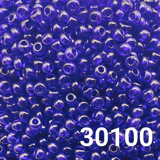 Preciosa 10/0 Transparent Cobalt seed beads 30100 — close-up royal blue glass rounds