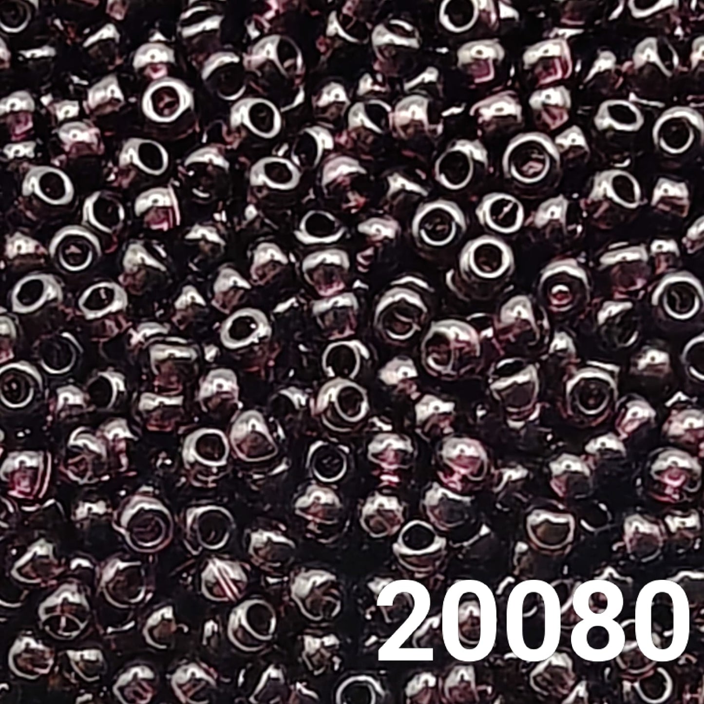 Preciosa 10/0 Transparent Dark Amethyst seed beads close-up
