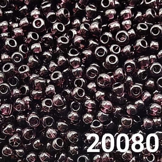 Preciosa 10/0 Transparent Dark Amethyst seed beads close-up