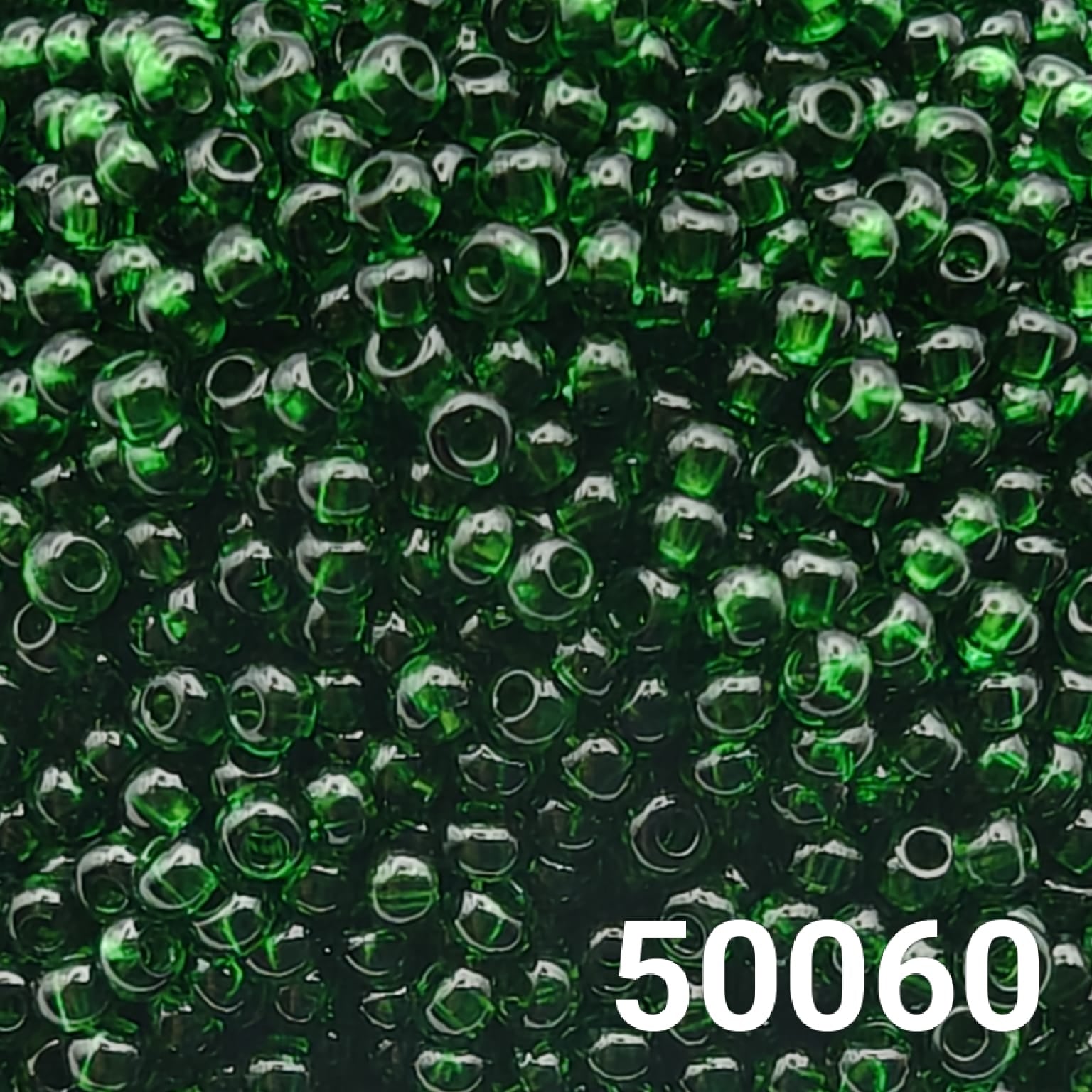 Transparent Emerald Green Czech Seed Beads 10/0 by Preciosa Ornela – perfect for jewelry and crafting.