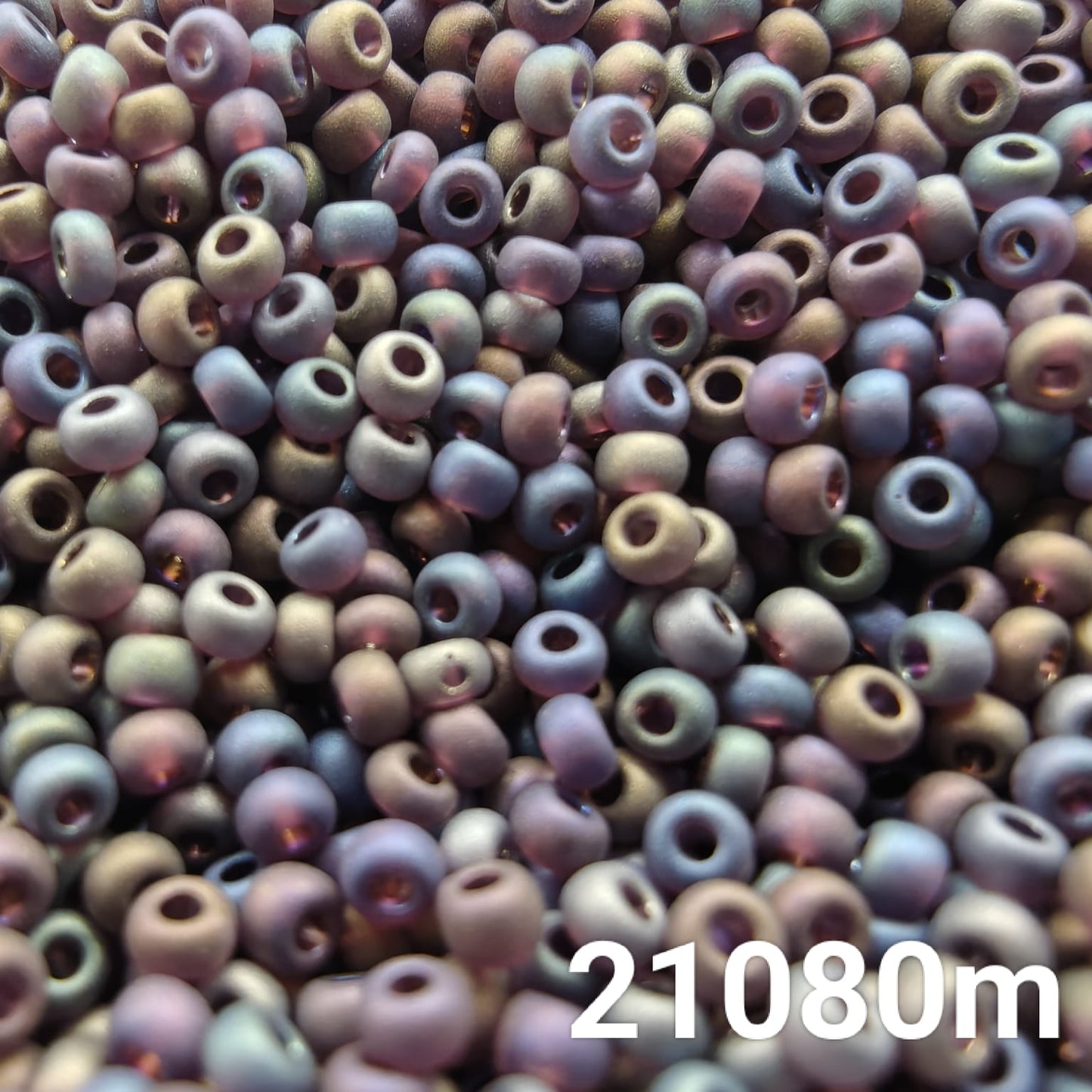 Close-up of PRECIOSA 10/0 Transparent Frosted Rainbow Purple seed beads – code 21080