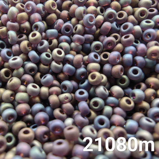 Close-up of PRECIOSA 10/0 Transparent Frosted Rainbow Purple seed beads – code 21080