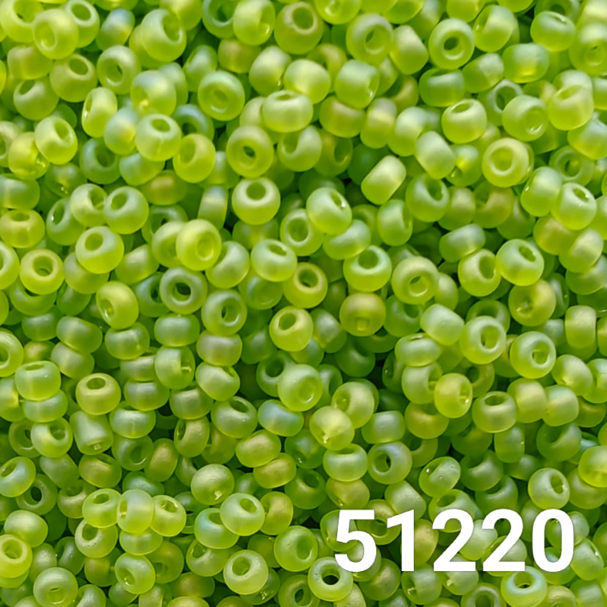 Close-up of Preciosa 10/0 seed beads in matte light green AB finish