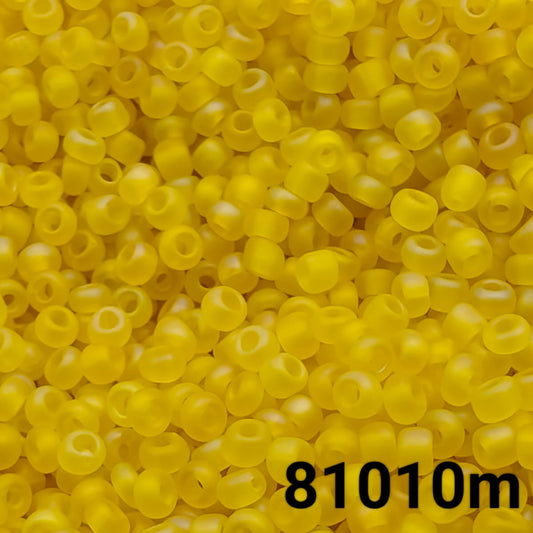 Close-up of Preciosa 10/0 seed beads in frosted rainbow transparent yellow color (81010m)
