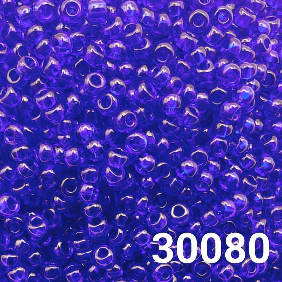 Preciosa 10/0 transparent sapphire Czech seed beads 30080 close-up