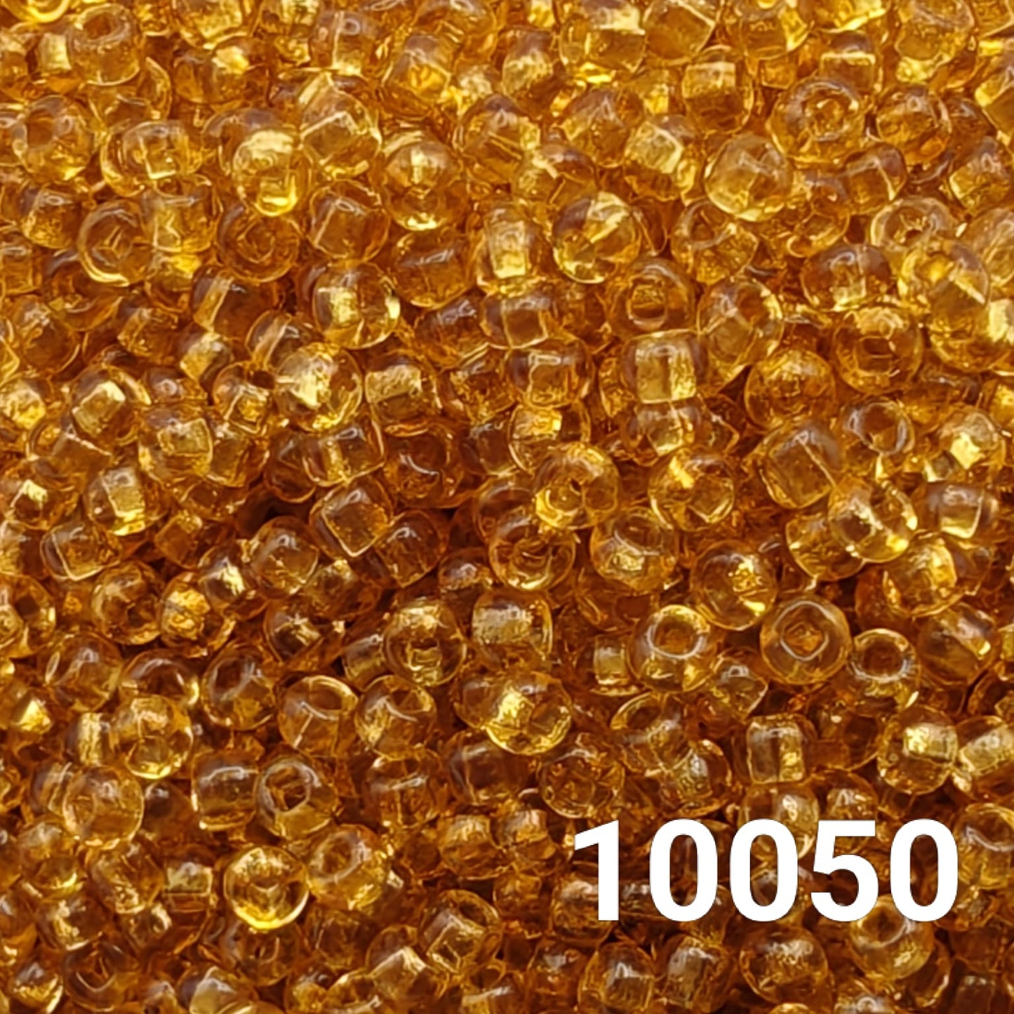 Transparent Topaz Preciosa Czech seed beads 10/0 round glass beads for beading and jewelry making.