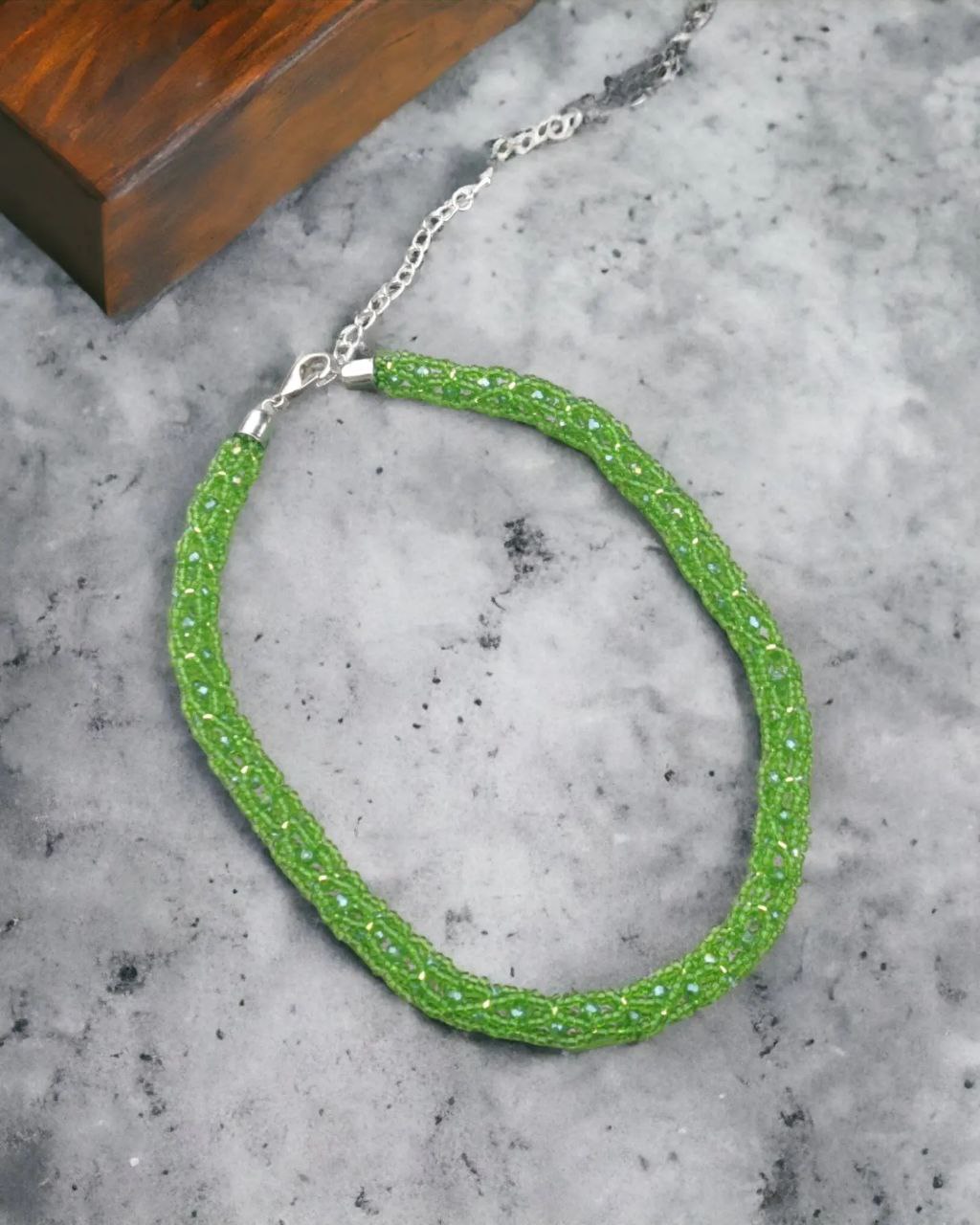 Green beaded choker necklace with extender chain and silver-plated end caps