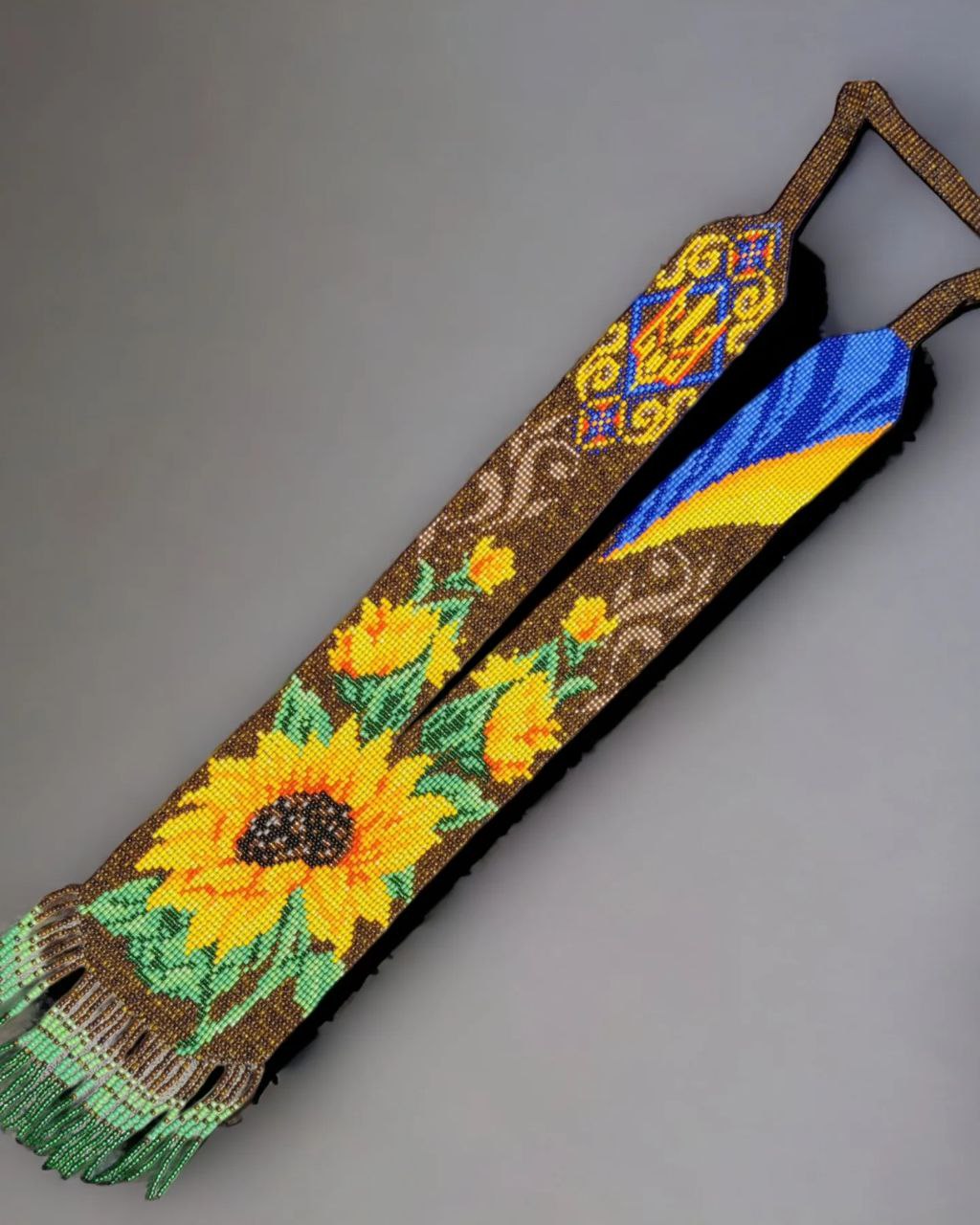 Long sunflower gerdan with fringe laid flat