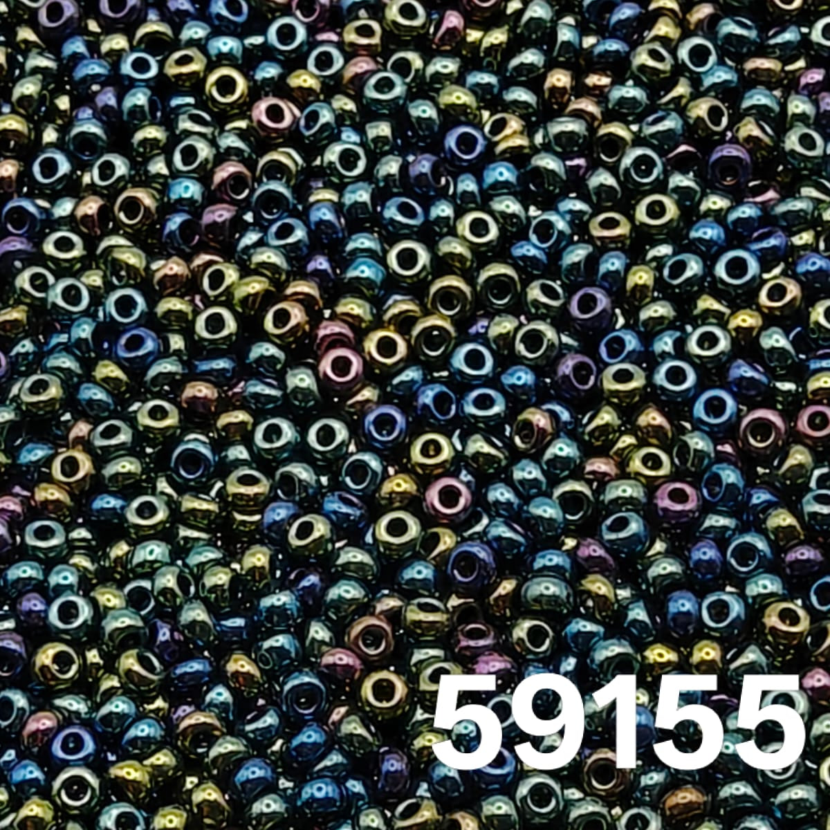 Macro close-up of Preciosa 10/0 Metallic Green Iris (59155) round seed beads — emerald/teal with peacock luster shifts to indigo, purple and bronze, Czech glass.