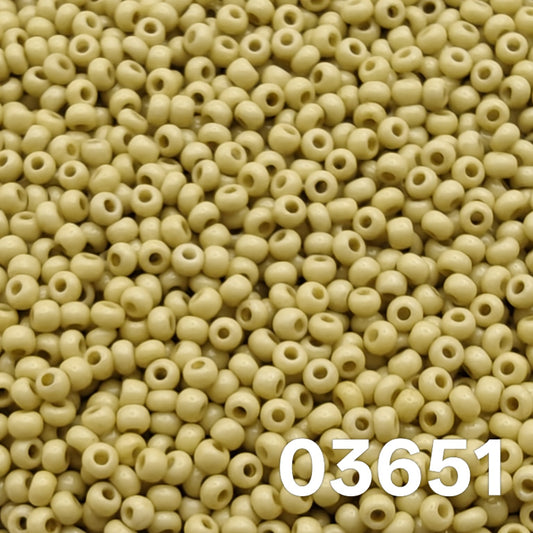 Macro close-up of Preciosa 10/0 Solgel Chalk Yellow-Green (03651) round seed beads — warm olive/sage opaque, glossy Czech glass.