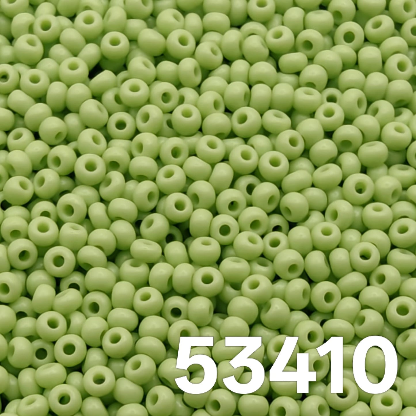 Opaque pale green Czech glass seed beads size 10/0 colour 53410 macro view