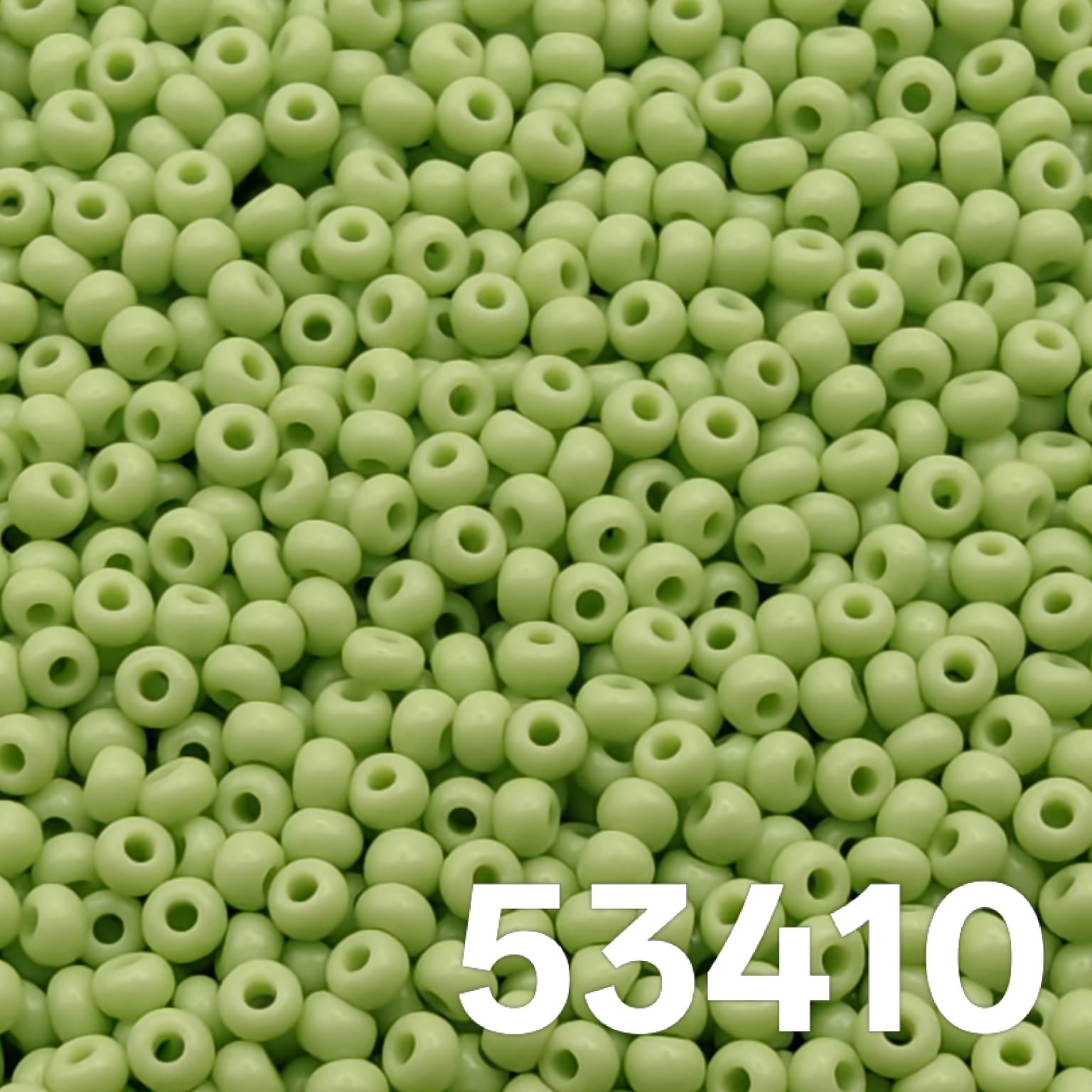 Opaque pale green Czech glass seed beads size 10/0 colour 53410 macro view