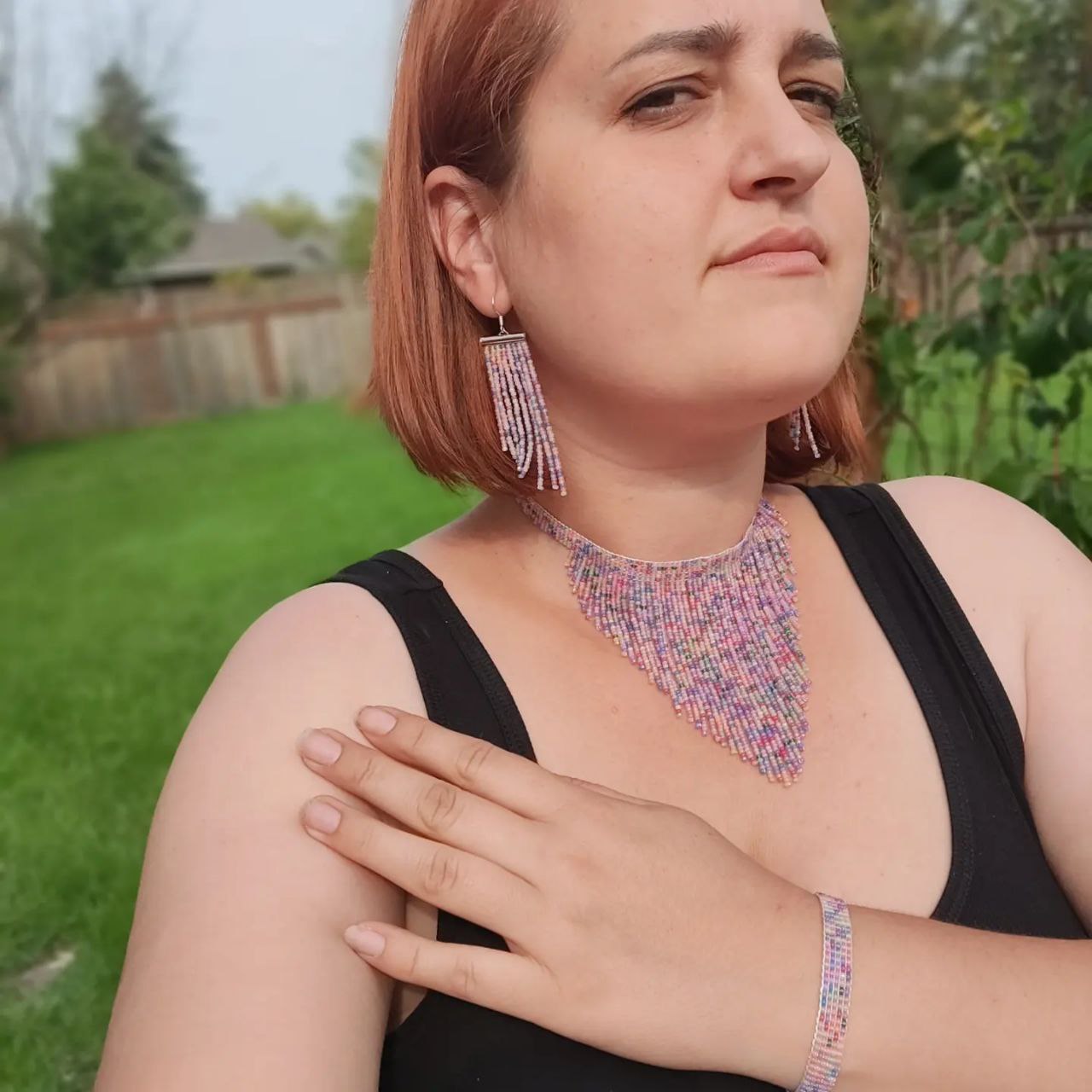 Pastel beaded fringe necklace on model