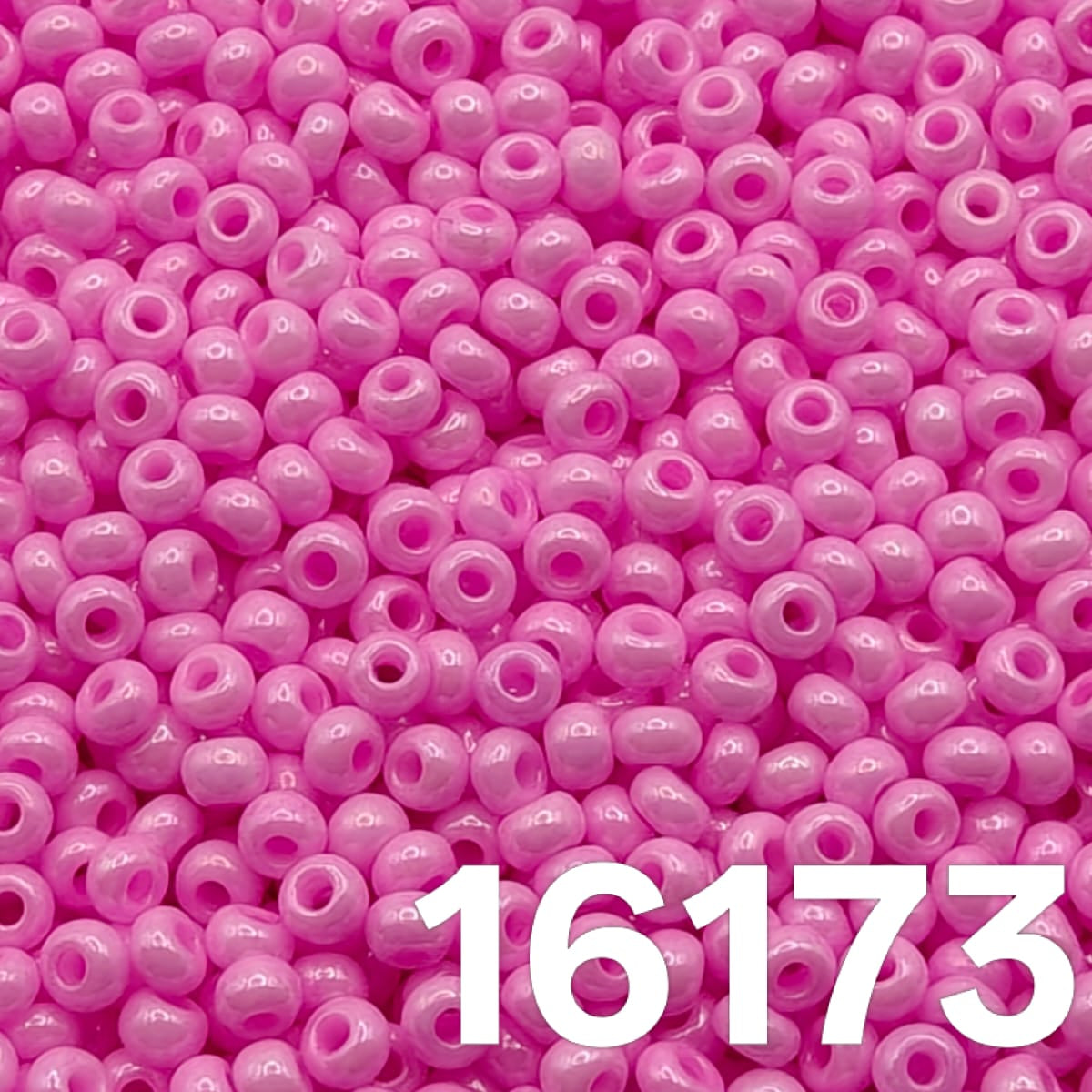 Preciosa 100 Opaque Dyed Chalk Pink 16173 seed beads — macro close-up of glossy round beads-1