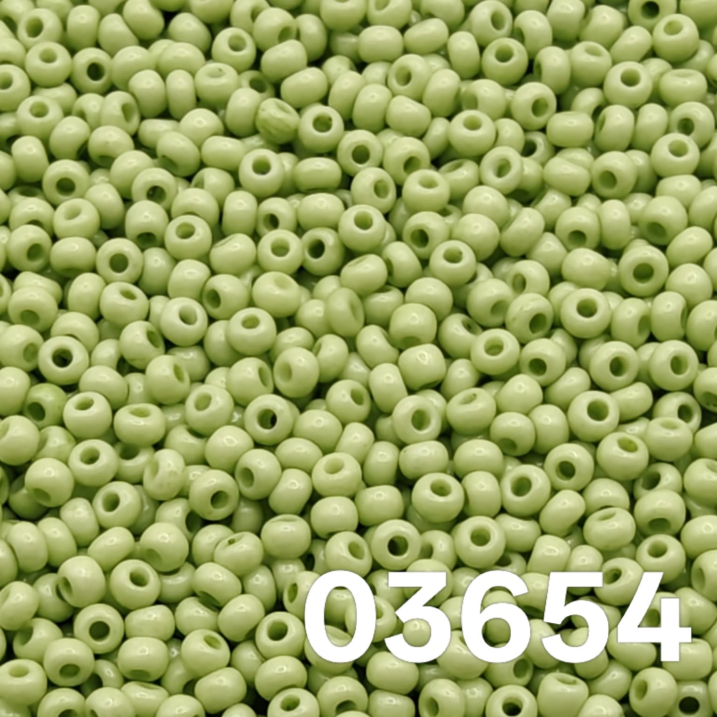 Preciosa 10/0 Czech seed beads — Solgel Chalk Green (03654), soft mint/sage.
