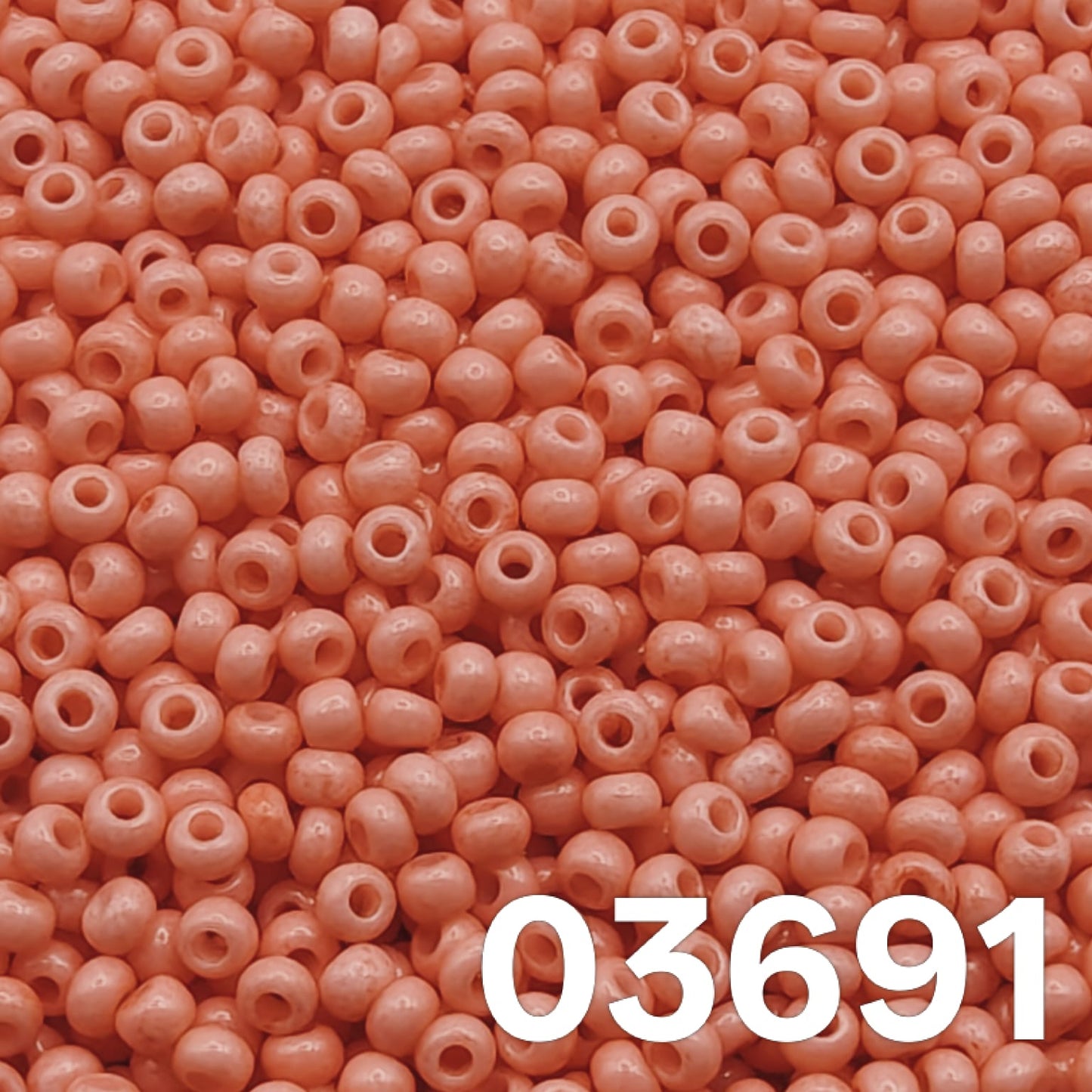Preciosa 10/0 Czech seed beads — Solgel Chalk Pink (03691), coral/salmon pastel.