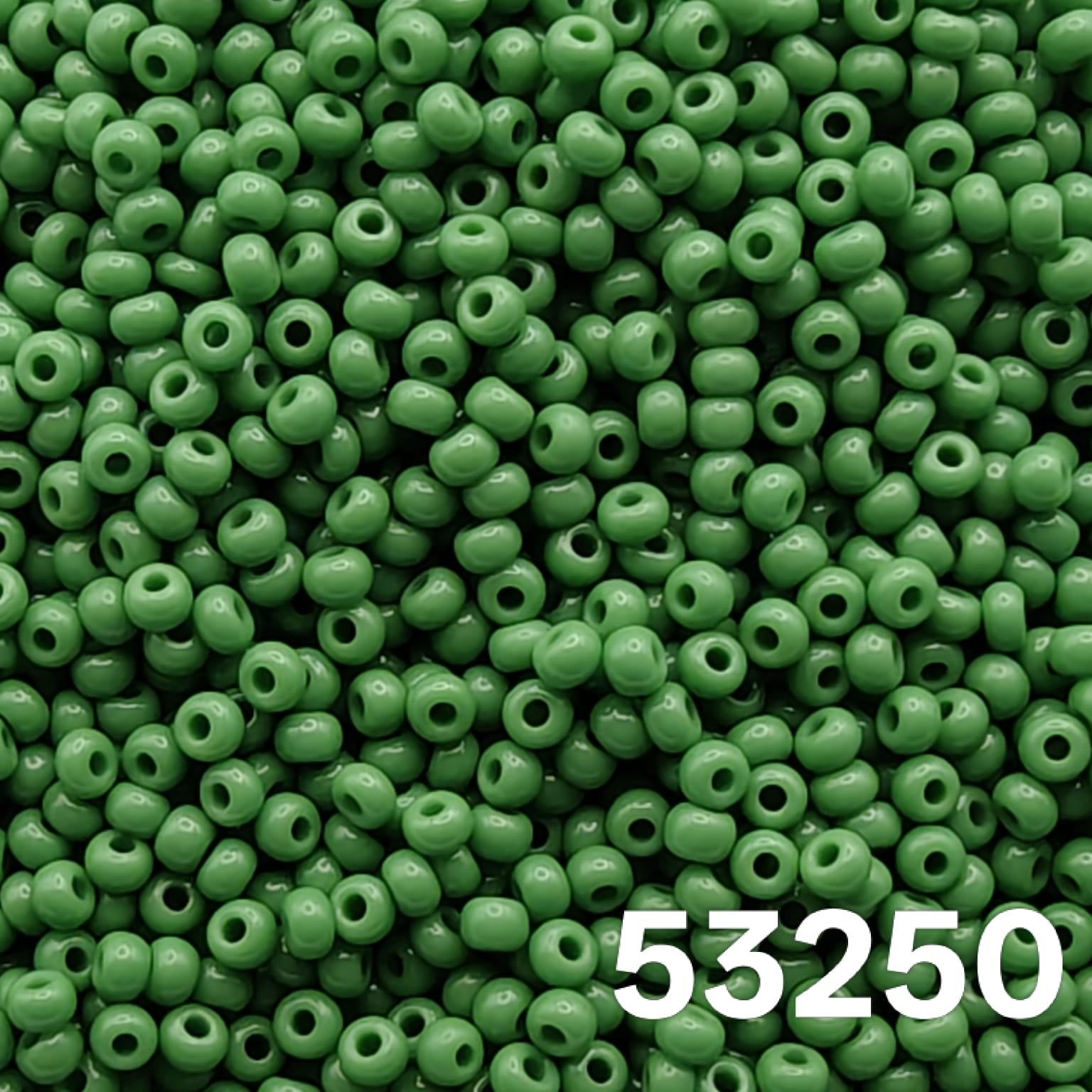 Preciosa 10/0 Opaque Green 53250 seed beads — close-up macro of round Czech glass beads