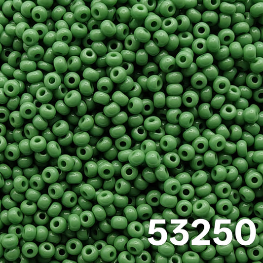 Preciosa 10/0 Opaque Green 53250 seed beads — close-up macro of round Czech glass beads