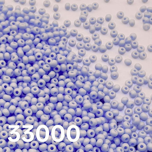 Preciosa 10/0 Opaque Light Blue 33000 Czech seed beads – macro close-up