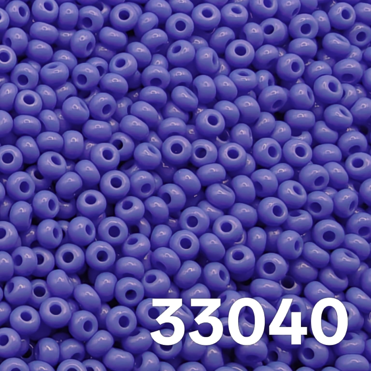 Preciosa 10/0 Opaque Medium Blue 33040 seed beads, glossy round Czech glass, macro close-up